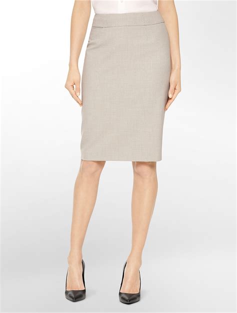Discover suit sets with a variety of silhouettes and tailored details for business and a casual wear. . Calvin klein skirt suit